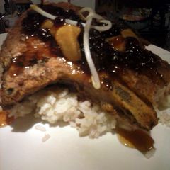 A picture of Brad's 5 spice pork chops with apple cranberry chutney.