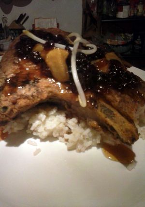 A picture of Brad's 5 spice pork chops with apple cranberry chutney.