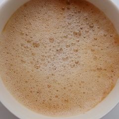 A picture of Monsoon Special Flat White Coffee.
