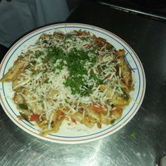 A picture of Pasta in red sauce.