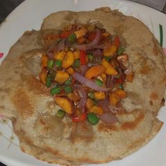 A picture of Fried flour with veggies.