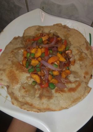 A picture of Fried flour with veggies.
