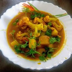 A picture of Aloo gobhi tamatar sabji.