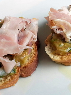 A picture of Ham On Baquette With Sambal Tomat /Indonesia Fusion.