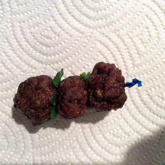 A picture of Ginger and Garlic Meatballs with aged Japaneese Soy sauce.