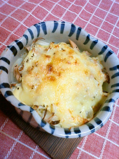 A picture of Baked Potato and Tuna with Cheese.