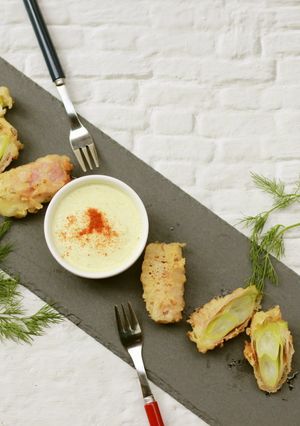 A picture of Beer-Battered Green Onion and Prosciutto Fritters.