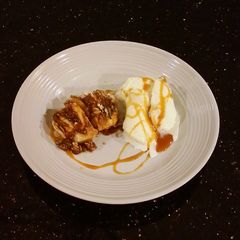 A picture of Hasselback Apples with Toffee / Oat Strusel Topping.