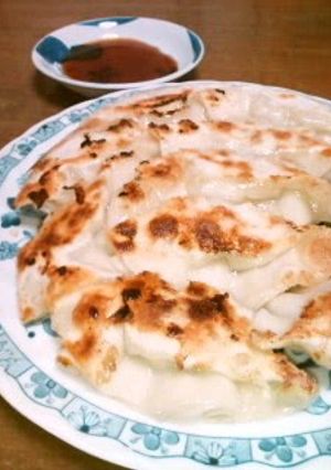 A picture of Delicious Gyoza Dumplings: Fried, Steamed, or Boiled!.