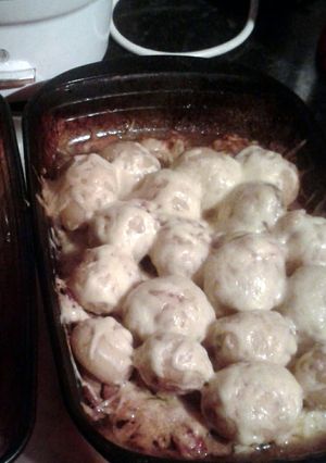 A picture of cheesy bacon baby boiled potatoes.