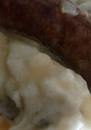 A picture of Crock-Pot Bangers & Mash w/ Onion Gravy.