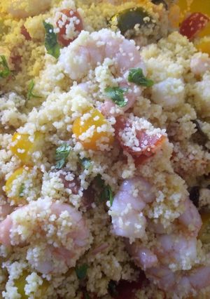 A picture of Colourful couscous salad with rainbow tomatoes lime & coriander.
