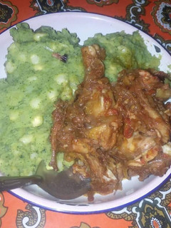 A picture of Matoke with Wet Fried Chicken.
