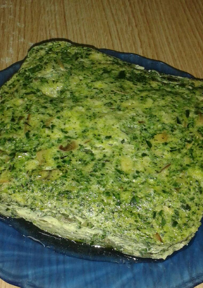Una foto de Pastel de espinacas, champiñones y queso al microondas