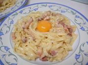 A picture of pasta carbonara egg yolks