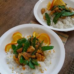 A picture of Ginger - Orange Chicken with Snow Peas.