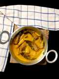 কাঁচা কলা দিয়ে শিং মাছের পাতলা ঝোল