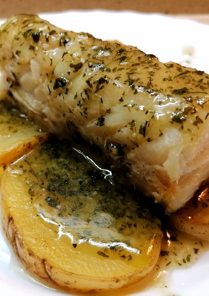 Una foto de Bacalao al horno con pil'pil de salsa verde