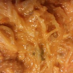 A picture of Tomato Cream with Meat over Spaghetti Squash.