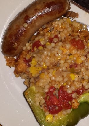 A picture of Couscous stuffed bell pepper.