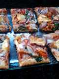 Ladybirds Duck and Feta Pizza .