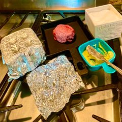 A picture of Beef or buffalo burger for one.