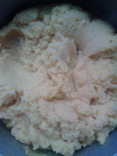 A picture of Jamaican turn corn meal and steamed fish head.
