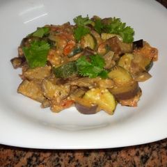 A picture of Eggplants and zucchini curry# coconut contenst.