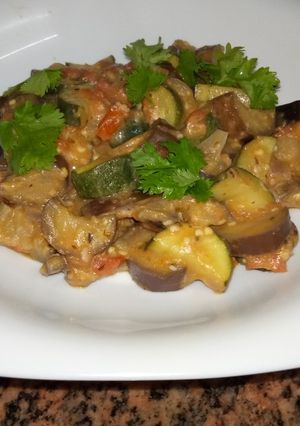 A picture of Eggplants and zucchini curry# coconut contenst.