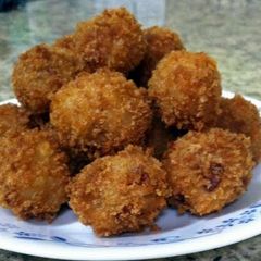 A picture of Loaded Potato Fritters.