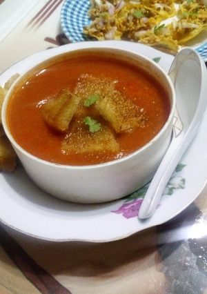 A picture of Tomato soup with Carrot and Potato.