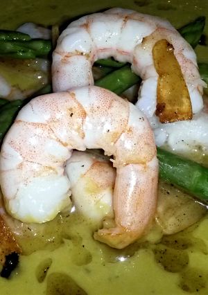 A picture of Sig's Garlic and Asparagus Soup with Chilli Prawn garnish.