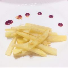 A picture of Mc Donald style French fries.