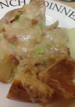 A picture of Irmgards Cheesy Bacon Melt with Jacket Potato.