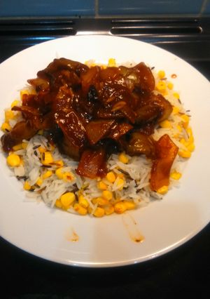 A picture of BBQ chicken with corn rice, for 2.