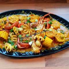 Kepiting, baby octopus saus padang রেসিপির প্রধান ছবি