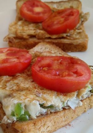 A picture of Open French Toast Egg and Tomato Sandwich.