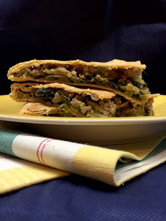 Foto di Focaccia di San Martino (con rape e salsiccia)