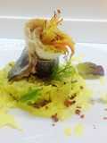 Rotolino di branzino su letto di patate e crema allo spumante