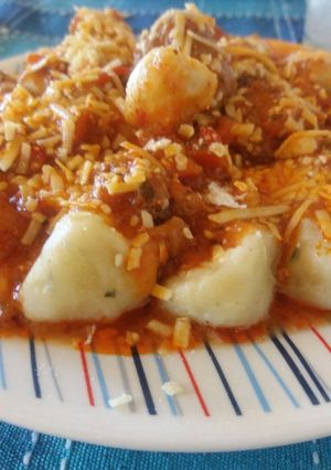 Una foto de Ñoquis rellenos de mozzarella