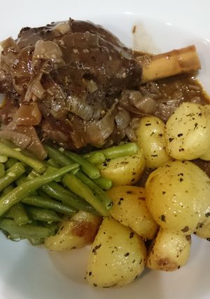 A picture of Braised lamb shanks with new potatoes and greens, for 2.