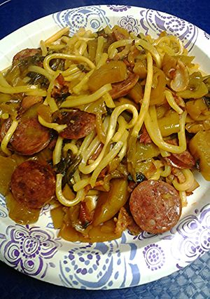 A picture of Udon noodles Cai chua ( pickled mustard)with pork.