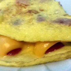 A picture of Elisa's Simple Tomato, Cheese and Ham Omelette.