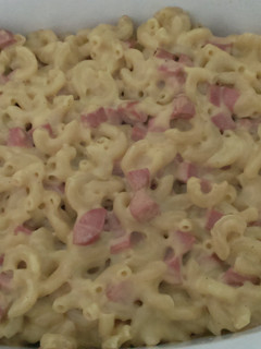 A picture of Macaroni and Cheese with Hot Dogs.
