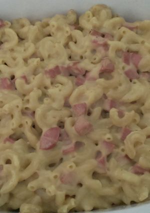 A picture of Macaroni and Cheese with Hot Dogs.
