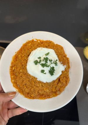 Una foto de Crema de lentejas rojas y calabaza