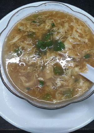 A picture of Egg Drops Capsicum Soup.