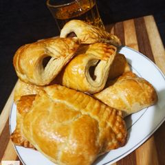 A picture of Sausage rolls in puff pastry.