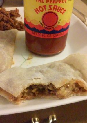 A picture of Mexican meat pockets.