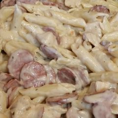 A picture of Chicken and Sausage Alfredo.